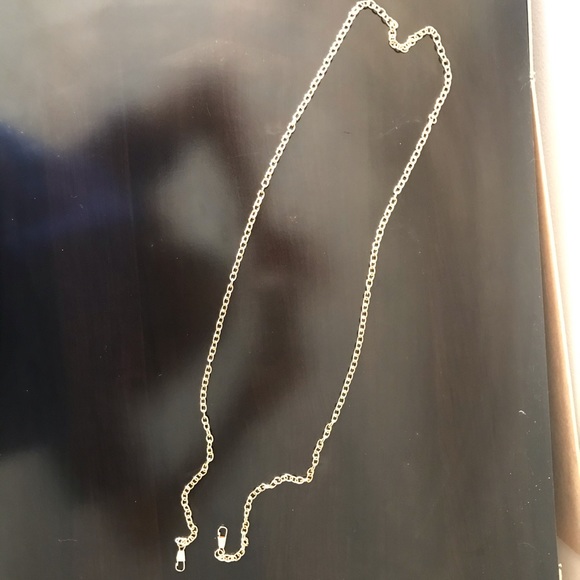 Beige clutch with gold metallic stripes - Picture 7 of 7